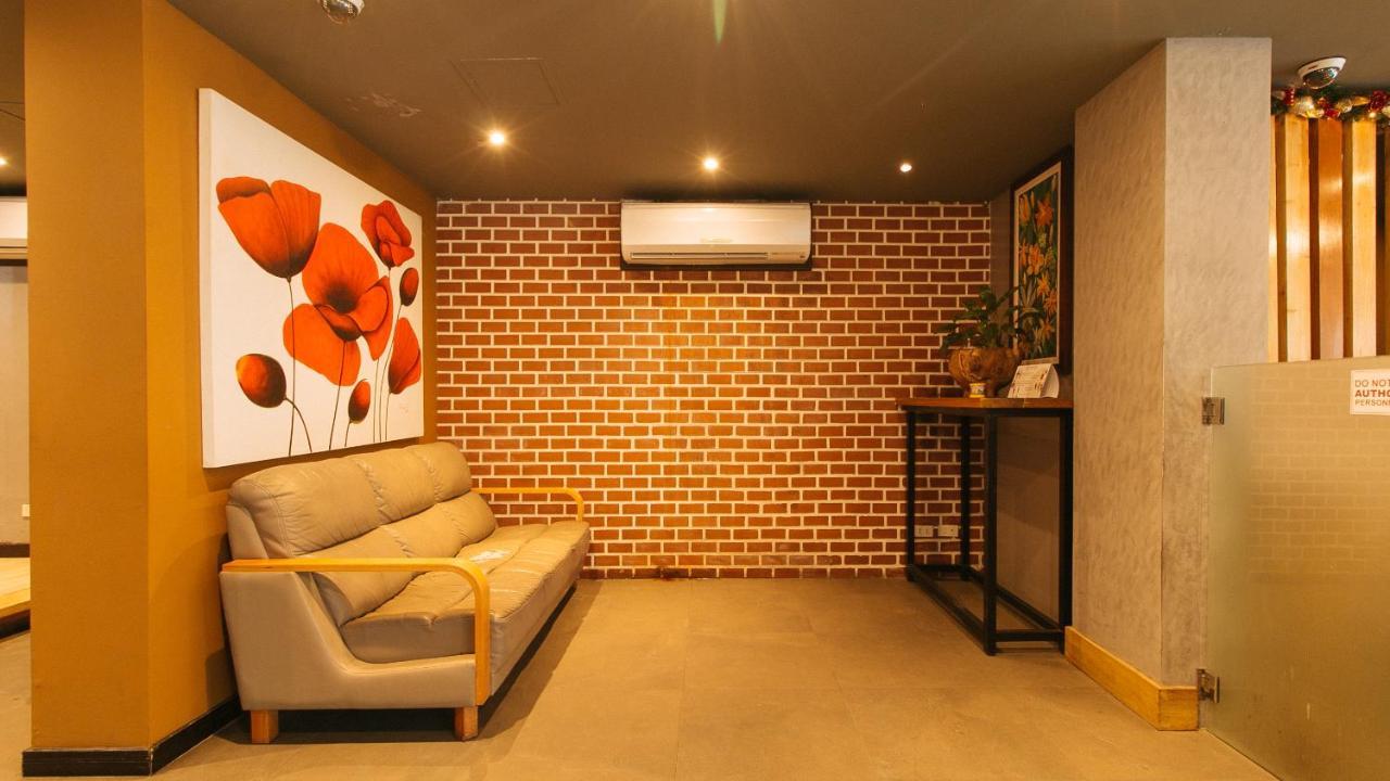 Guijo Suites Makati Макати Экстерьер фото