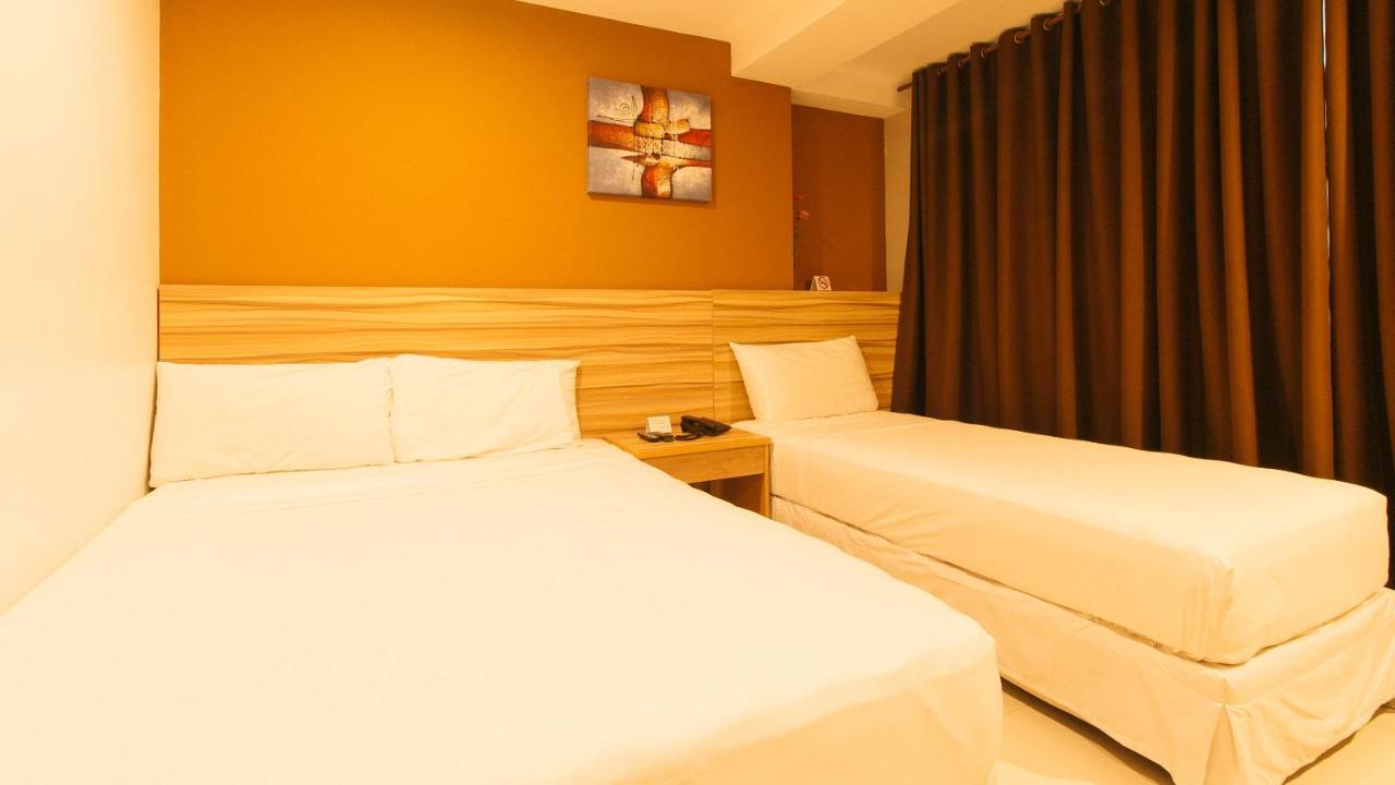 Guijo Suites Makati Макати Экстерьер фото