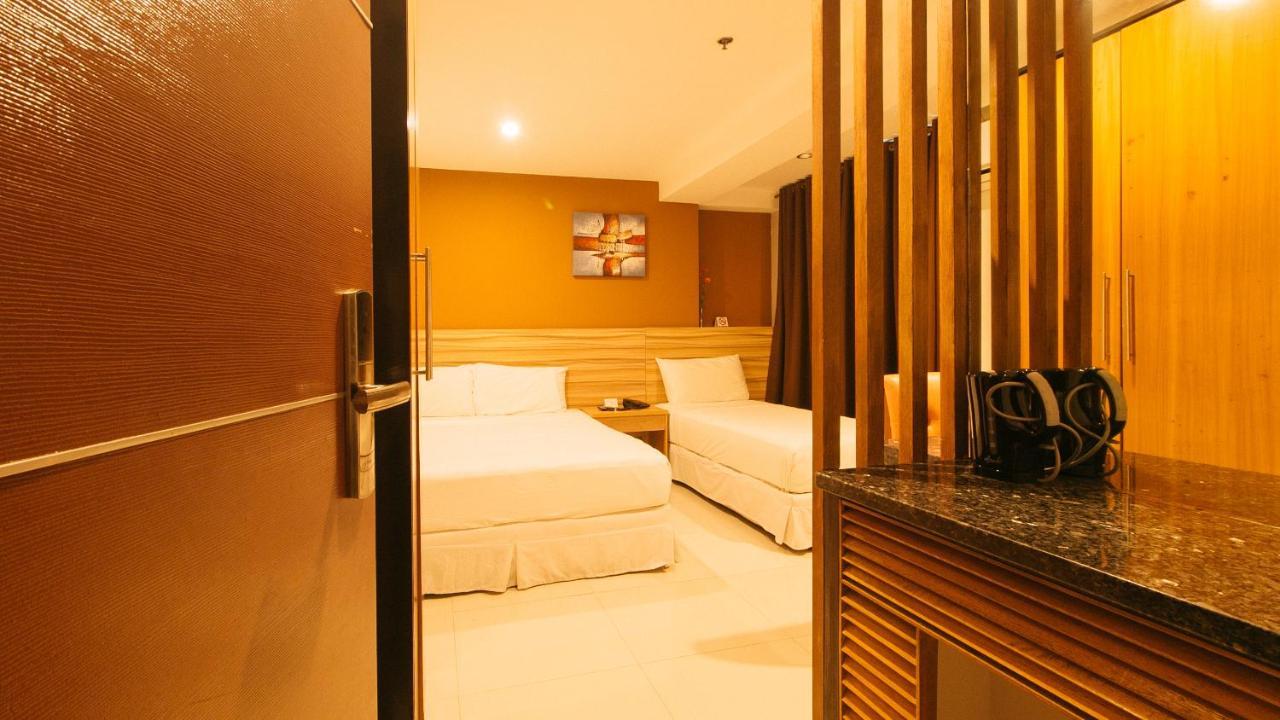Guijo Suites Makati Макати Экстерьер фото