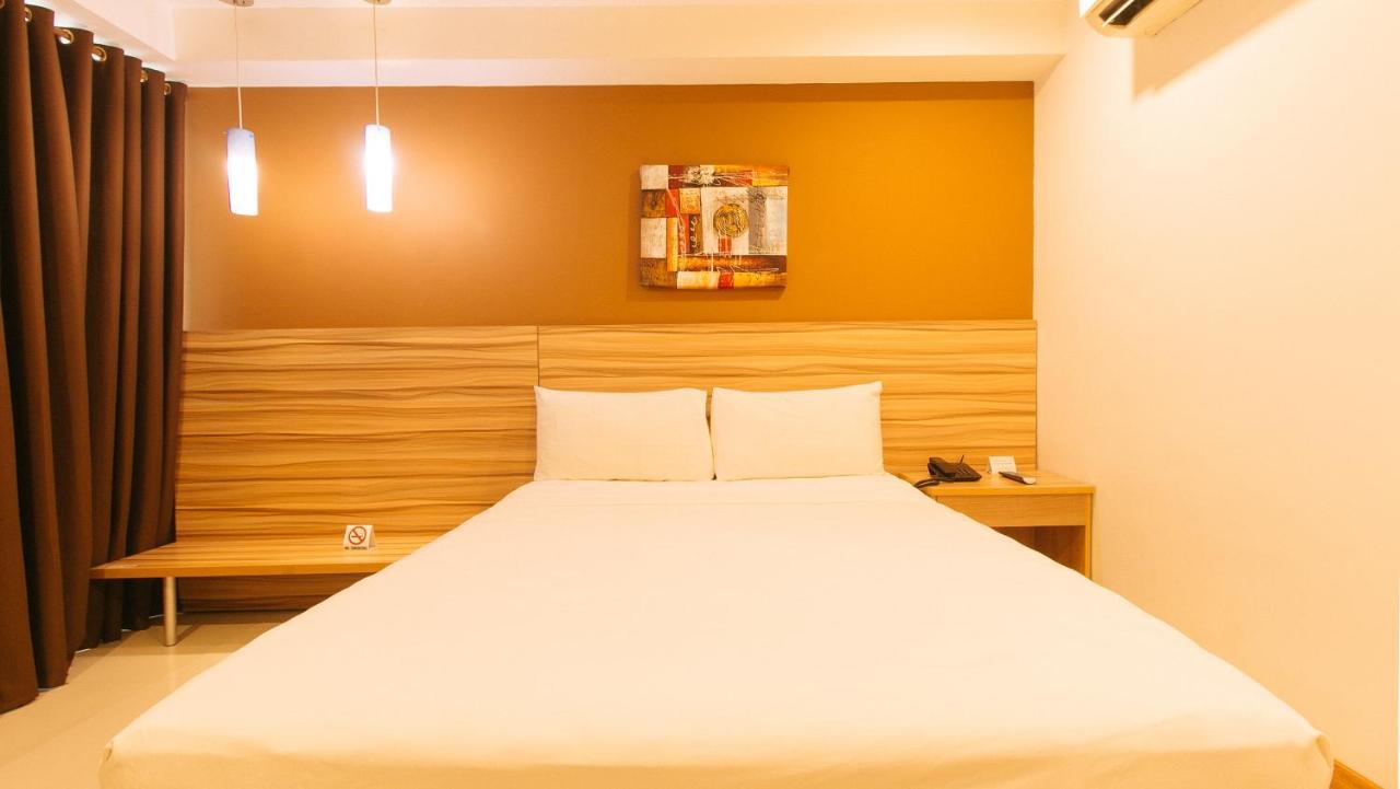 Guijo Suites Makati Макати Экстерьер фото