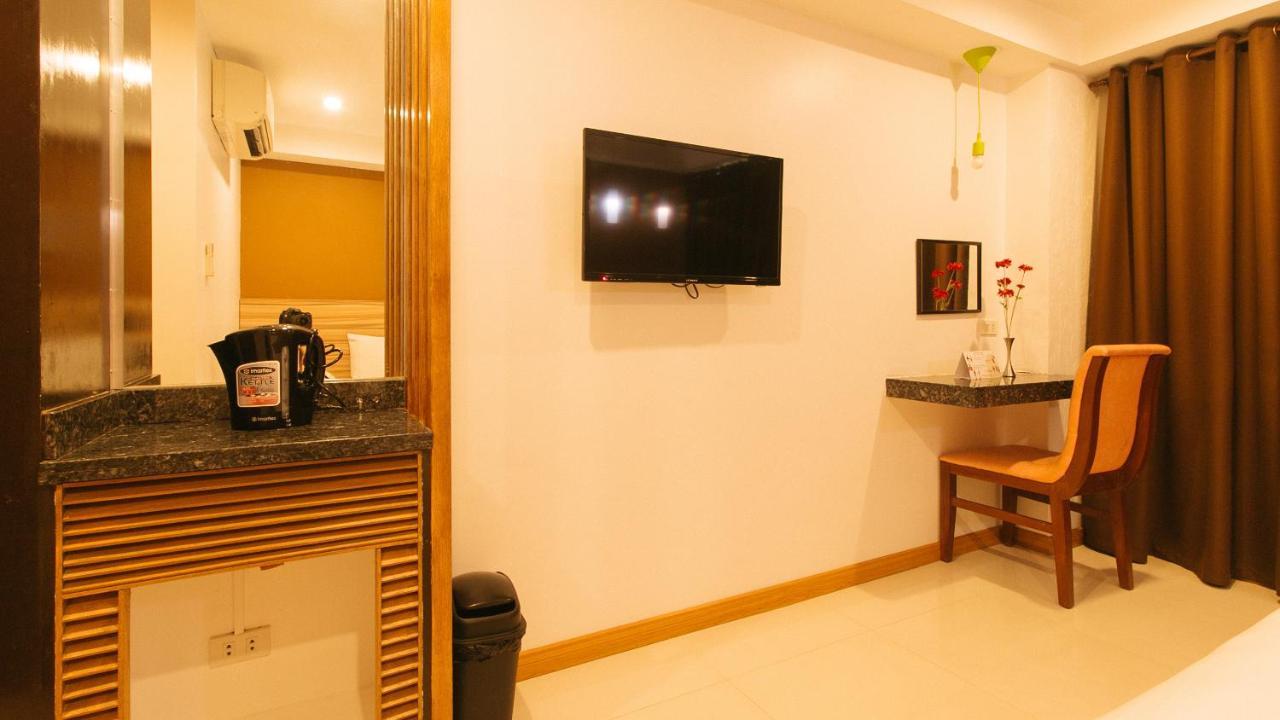 Guijo Suites Makati Макати Экстерьер фото