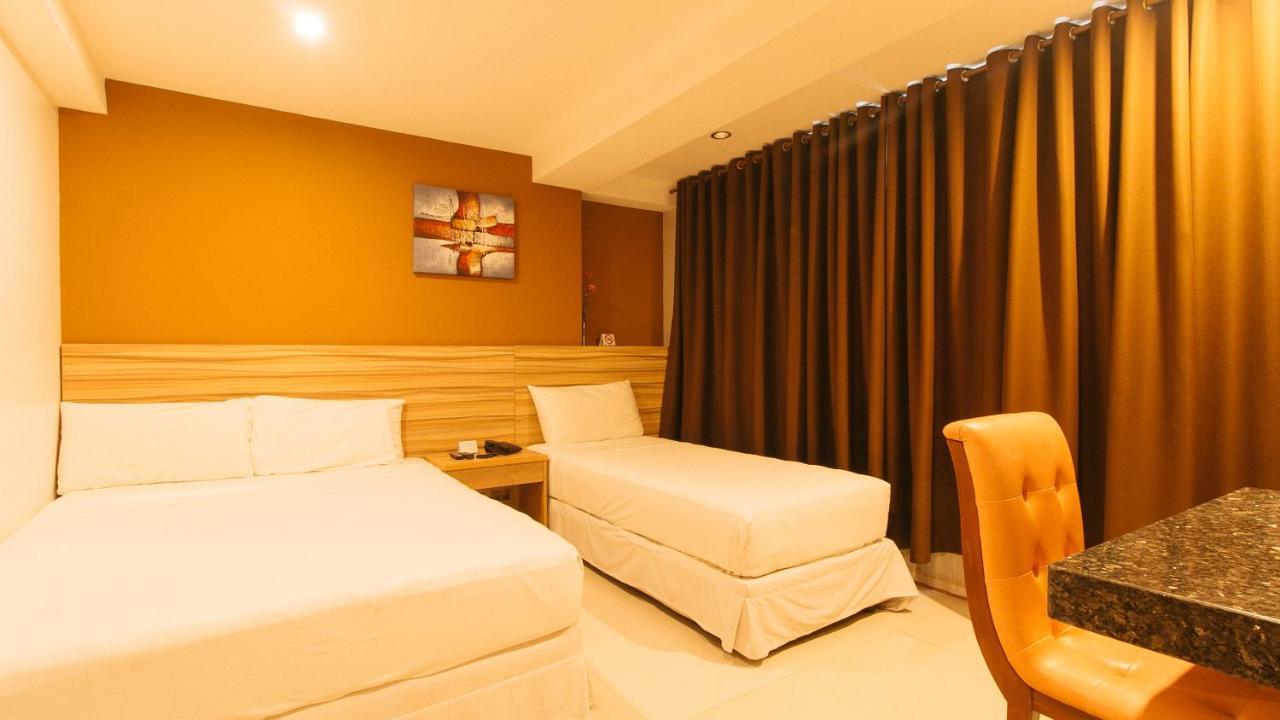 Guijo Suites Makati Макати Экстерьер фото