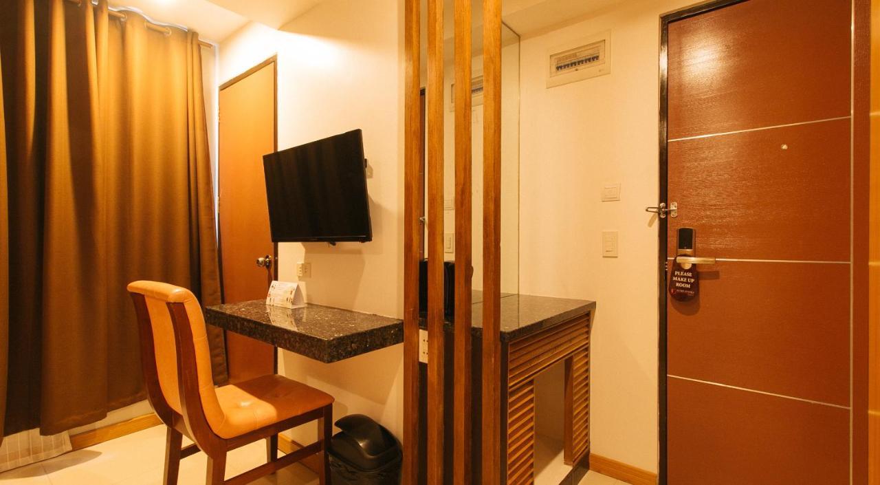 Guijo Suites Makati Макати Экстерьер фото