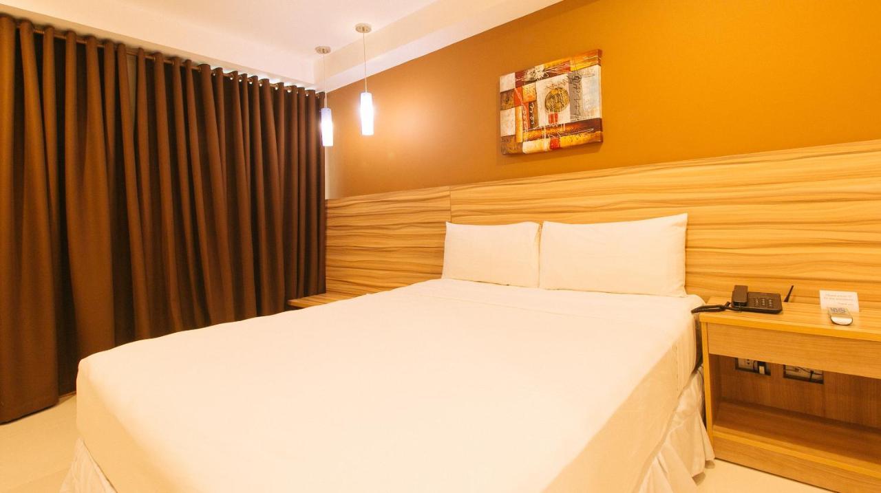Guijo Suites Makati Макати Экстерьер фото