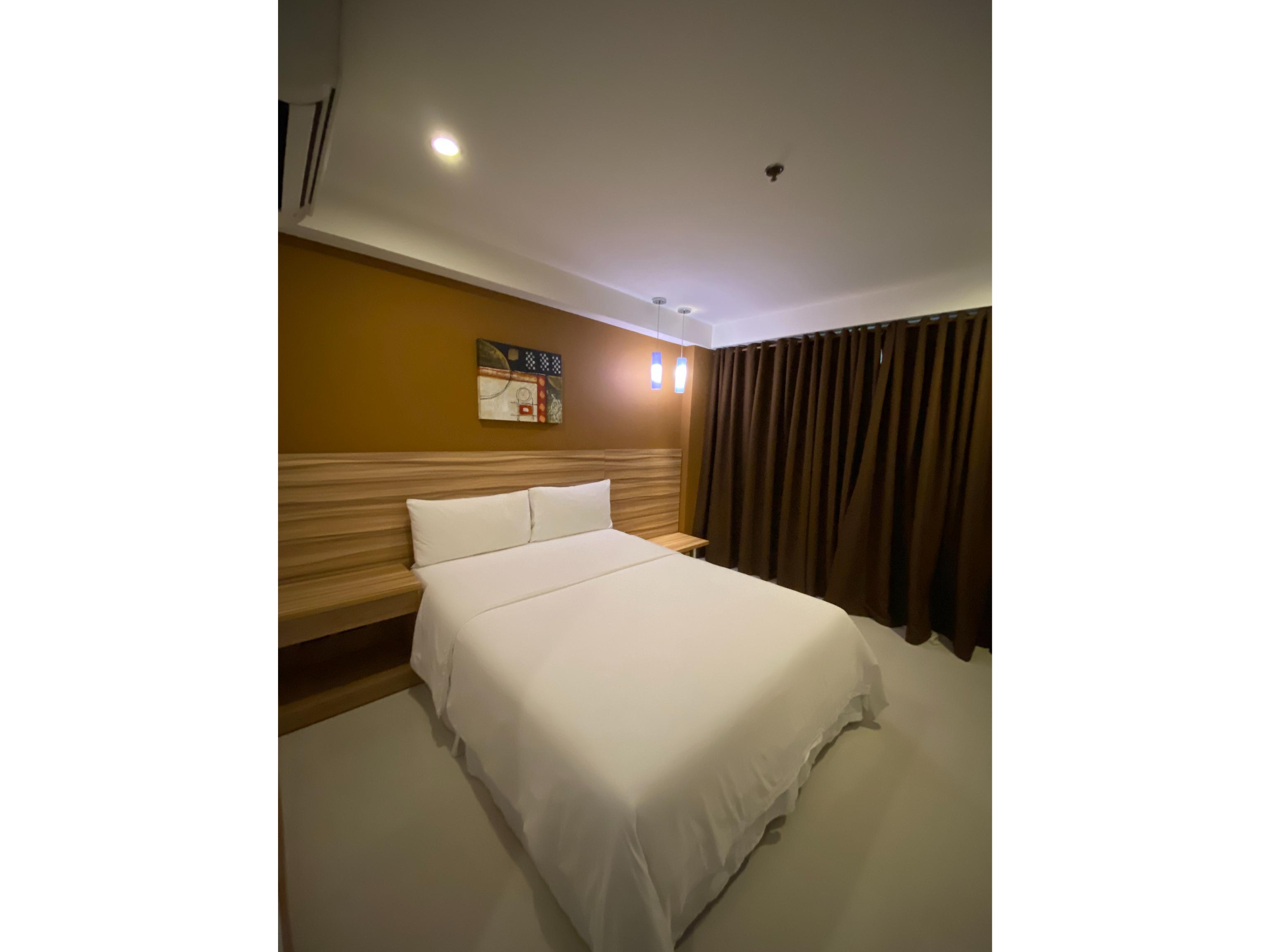 Guijo Suites Makati Макати Экстерьер фото