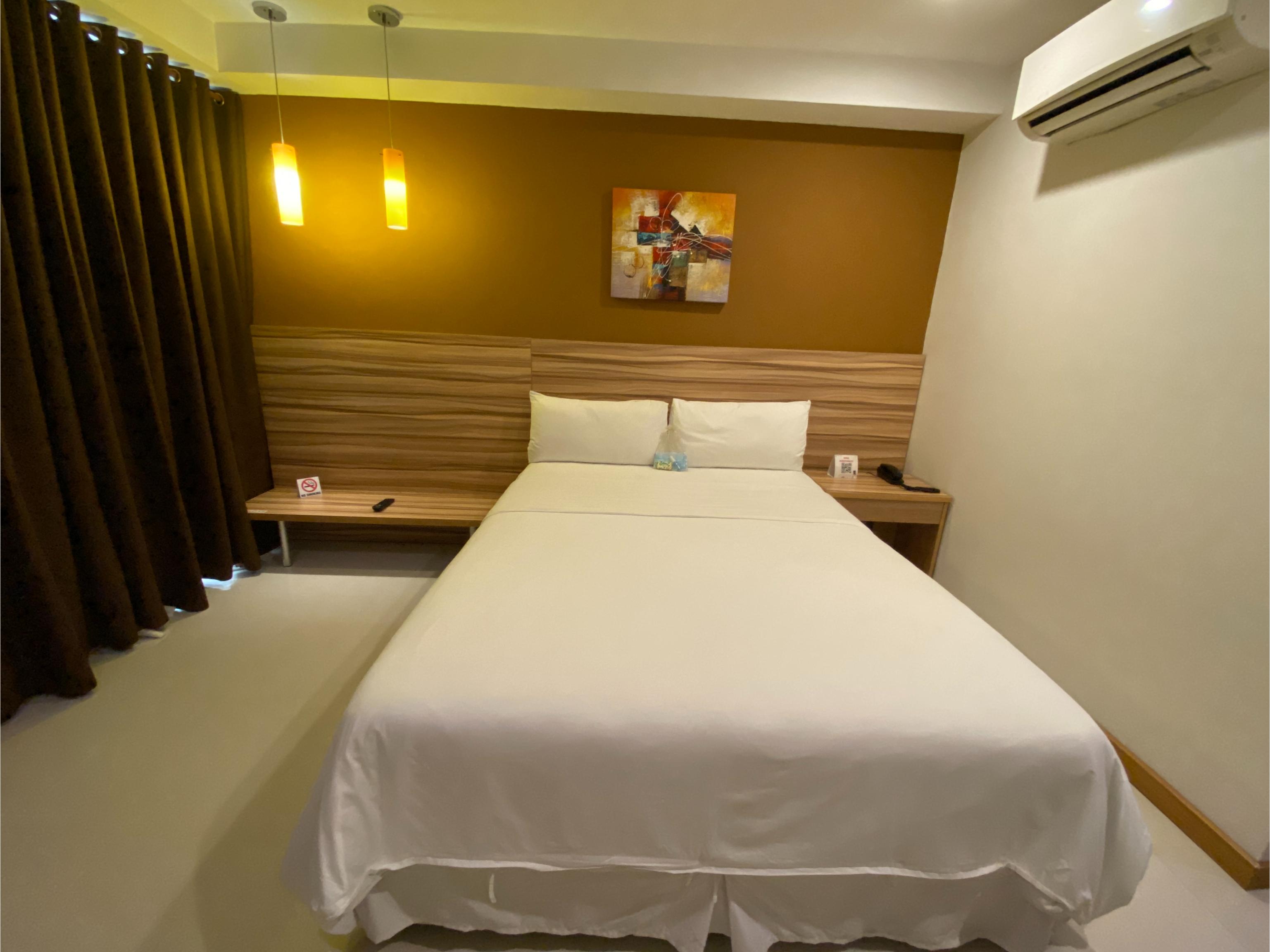 Guijo Suites Makati Макати Экстерьер фото