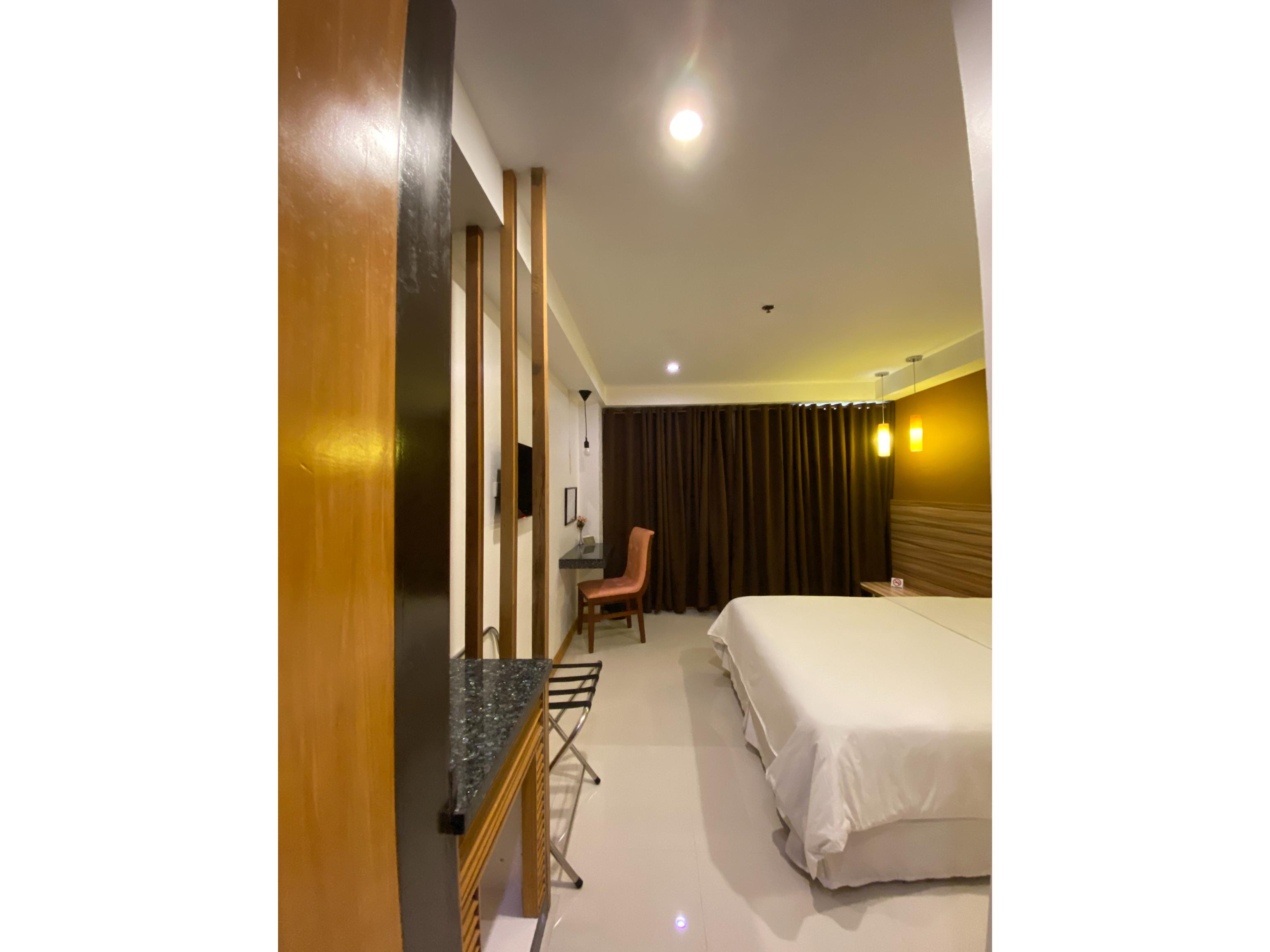 Guijo Suites Makati Макати Экстерьер фото