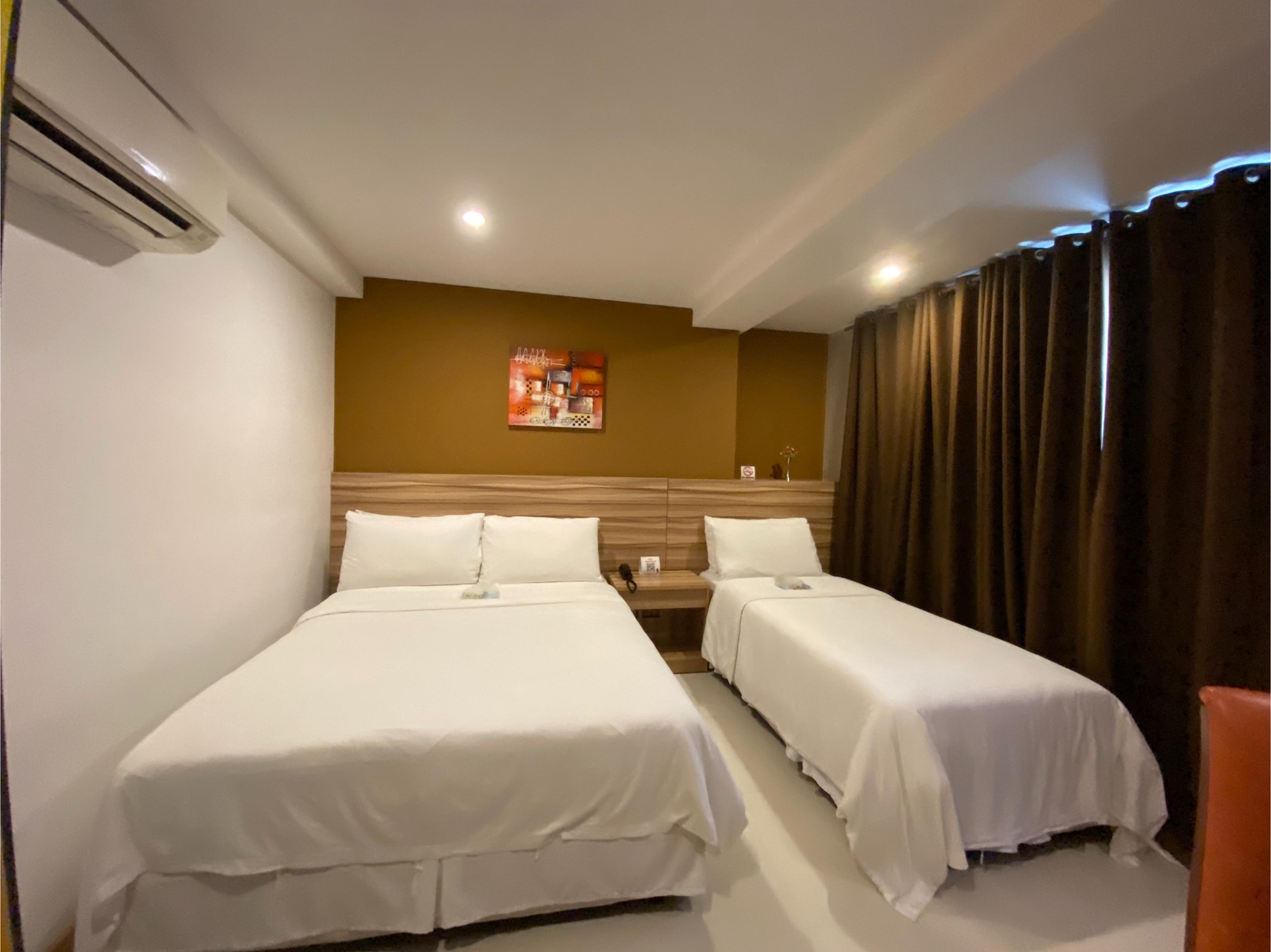 Guijo Suites Makati Макати Экстерьер фото