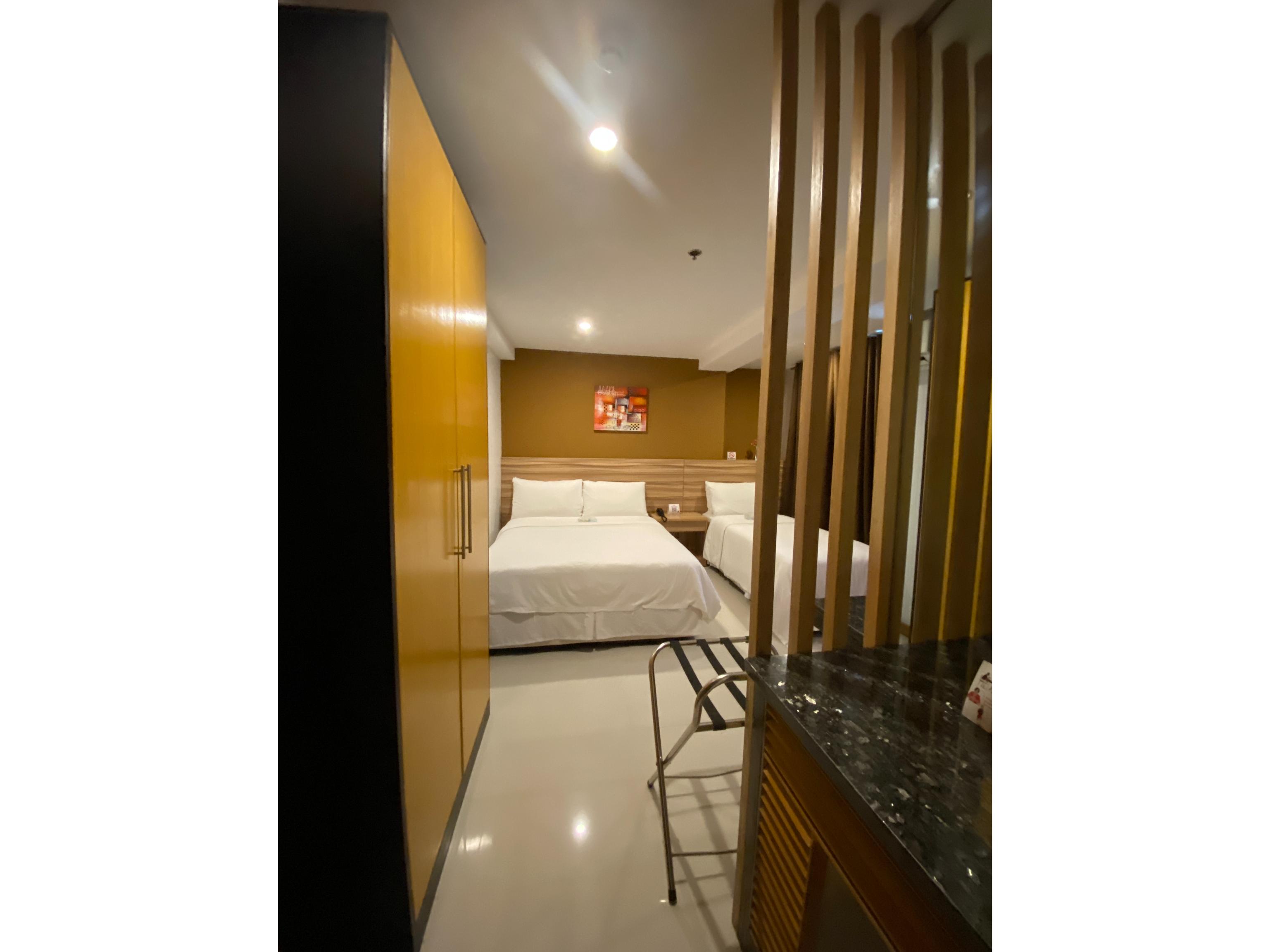 Guijo Suites Makati Макати Экстерьер фото